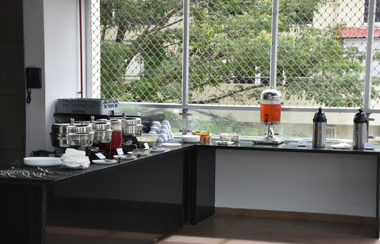 Heritage Inn Mysore Bagian luar foto