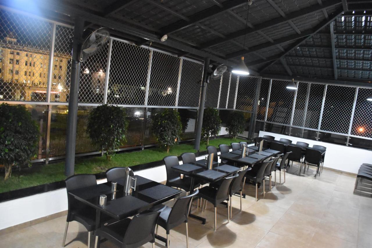 Heritage Inn Mysore Bagian luar foto