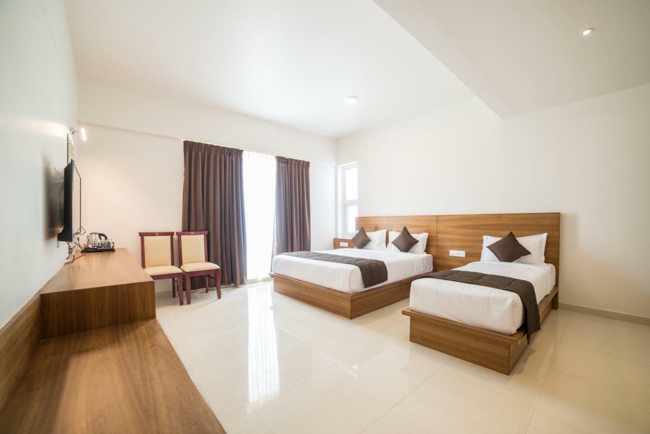 Heritage Inn Mysore Bagian luar foto